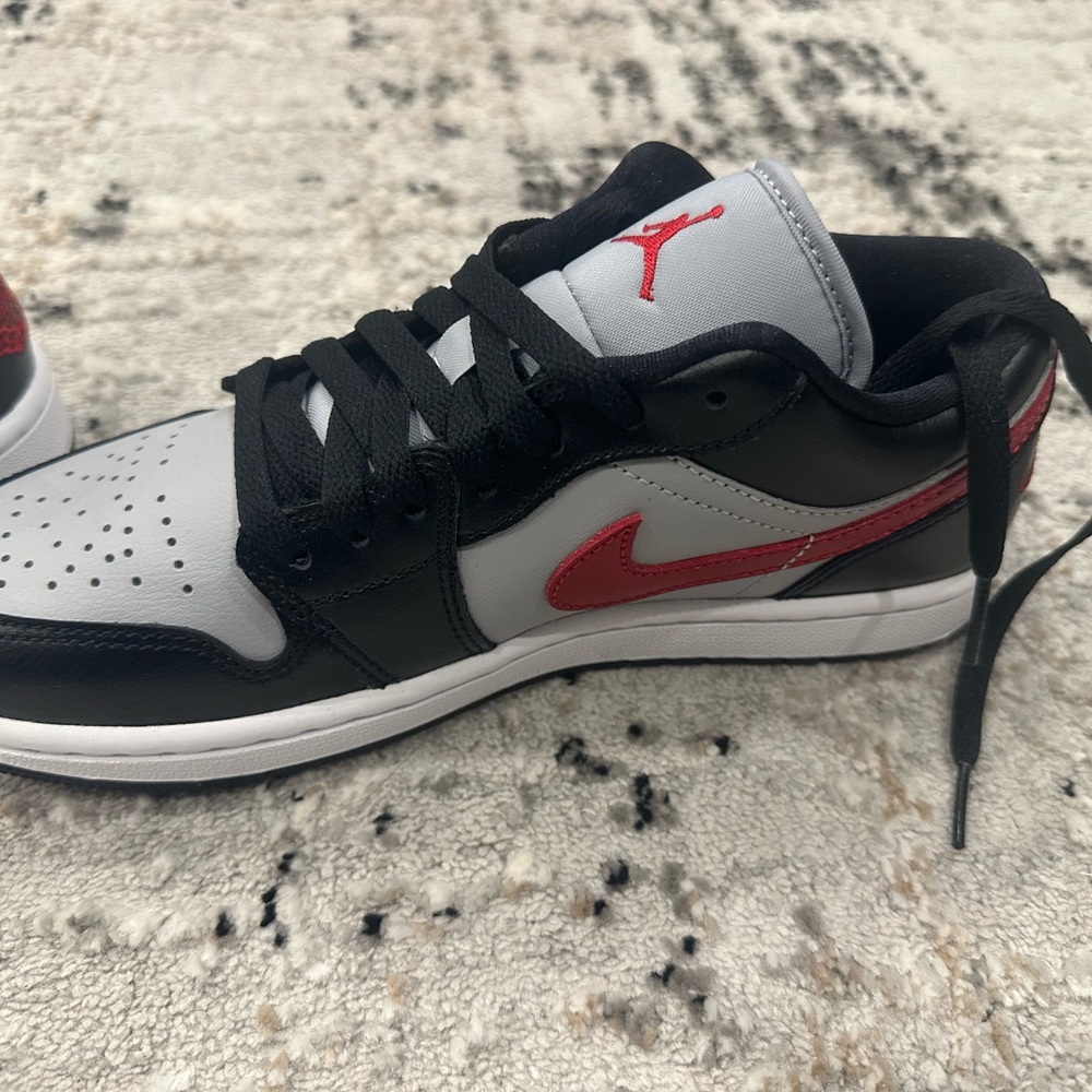 Jordan Low Top Sneaker in Black, Gray and Red